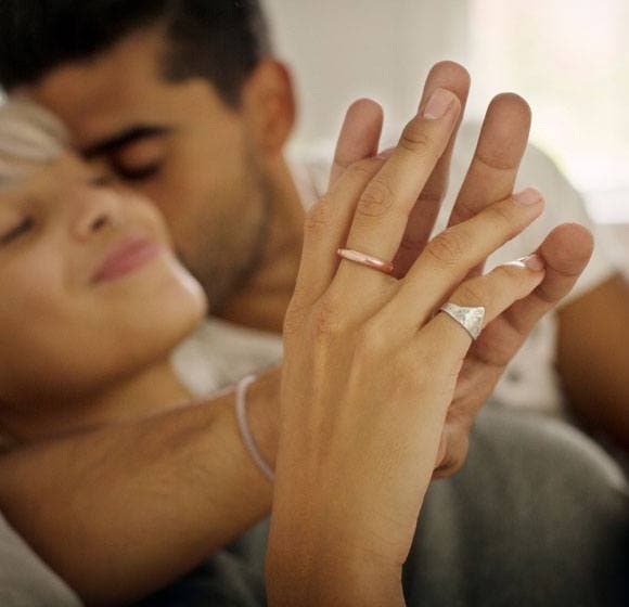 Singles enjoying a quiet moment of snuggling.